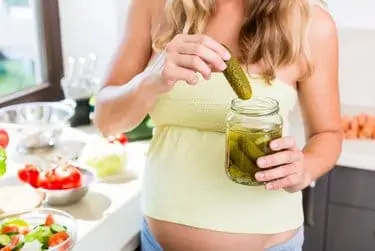 Pregnant woman craving for pickled gherkins