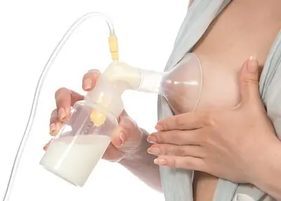 mom trying with breast pump