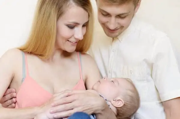 Young family with kid sleeping