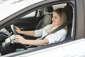 woman drives a car