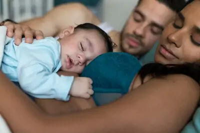 mom lets baby sleep on chest