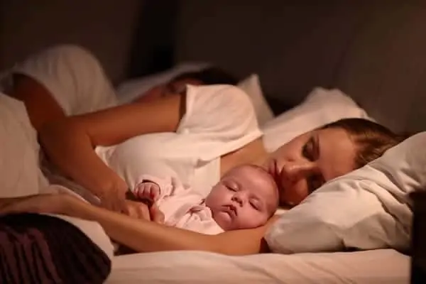 mom sleeping with baby at night