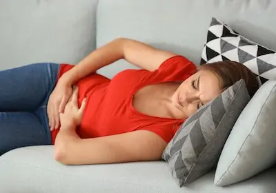 woman having gas pain