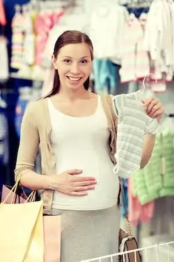 woman doing shopping while pregnant