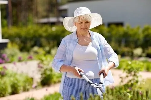 Happy senior woman gardening