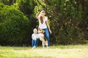 playing with dog in yard