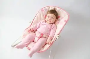 smiling baby on bouncer