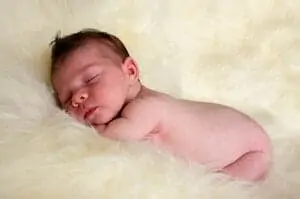 Newborn sleeping naked peacefully