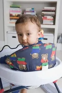 baby looking back while on a walker