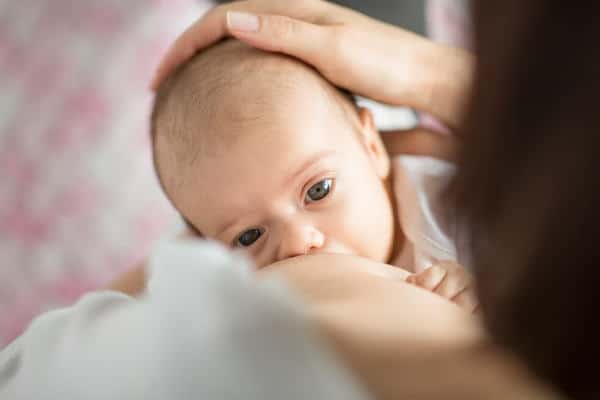 baby-grunting-squirming-gulping-while-breastfeeding