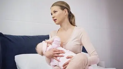 baby cries while breastfeeding