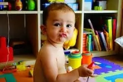 funny face by baby while playing