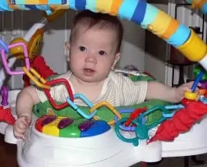 baby playing in a bouncer