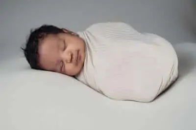 swaddled baby sleeping