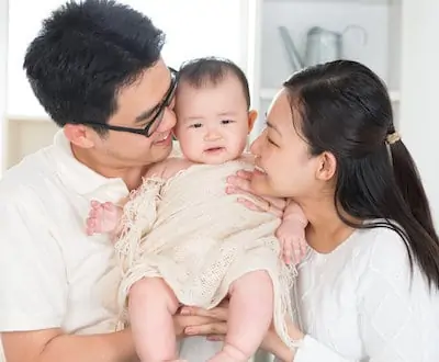 mom and dad happy with baby