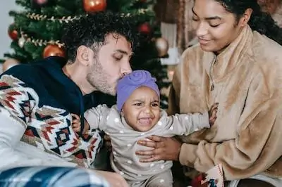 baby cries while with parents