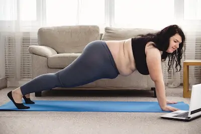 Obese woman working out