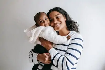 Happy mom with a toddler