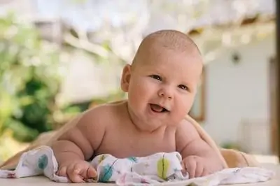 adorable boy crawling