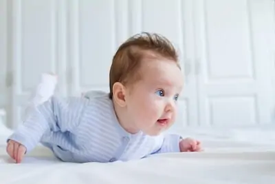 baby busy doing tummy time