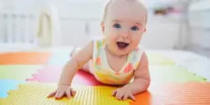 baby on playing mat
