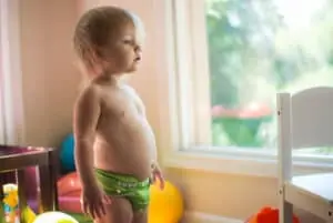 baby using cloth diaper