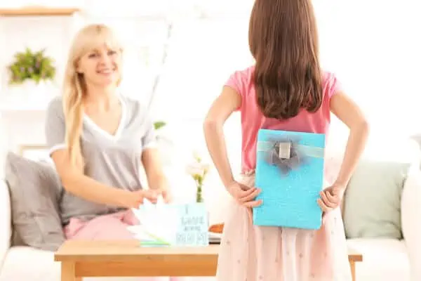 little girl with gift for mom