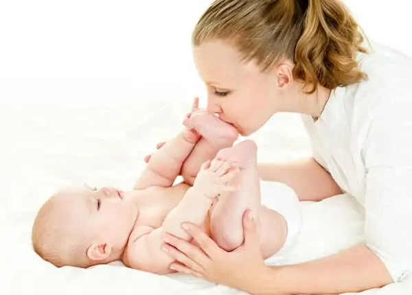 Mother massaging kid