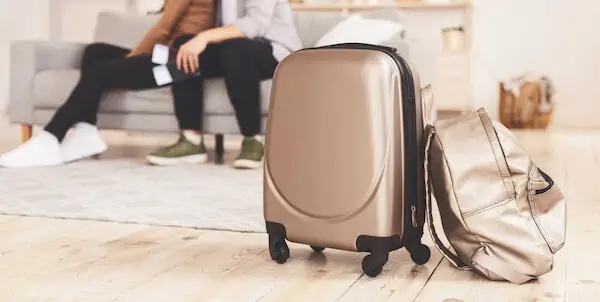 husband gets ready for traveling