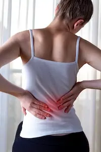 woman feeling hip pain