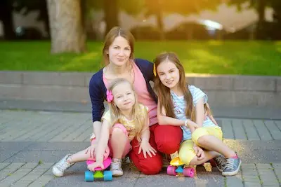 mom with daughters having fun outdoor