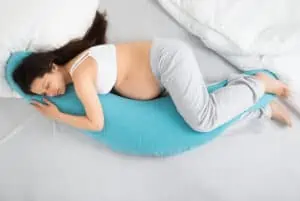 pregnant woman sleeps on belly