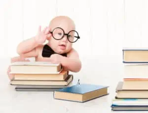 smart looking baby with glass