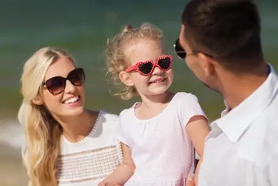 family enjoying summer vacation in beach