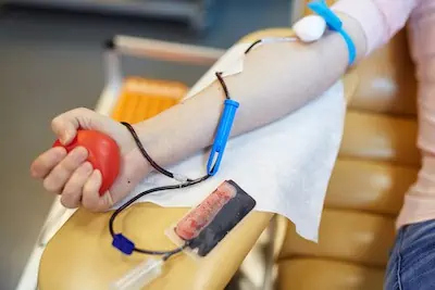 a woman giving blood