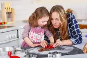 mom and kids cooking together