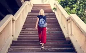 Woman Traveler Walking Stairs