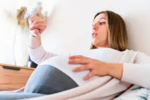 pregnant woman anxiously waiting for labor